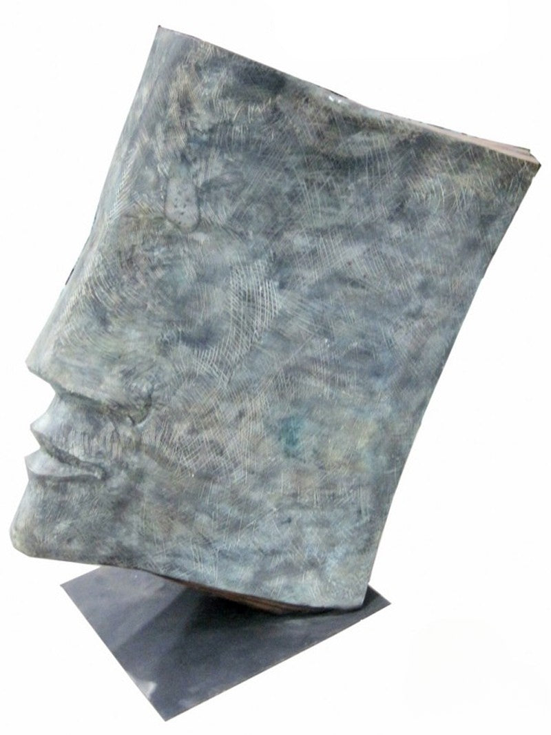 Brass luxury handmade furniture sculpture of a face, perfect for modern luxury decor, on a white background.