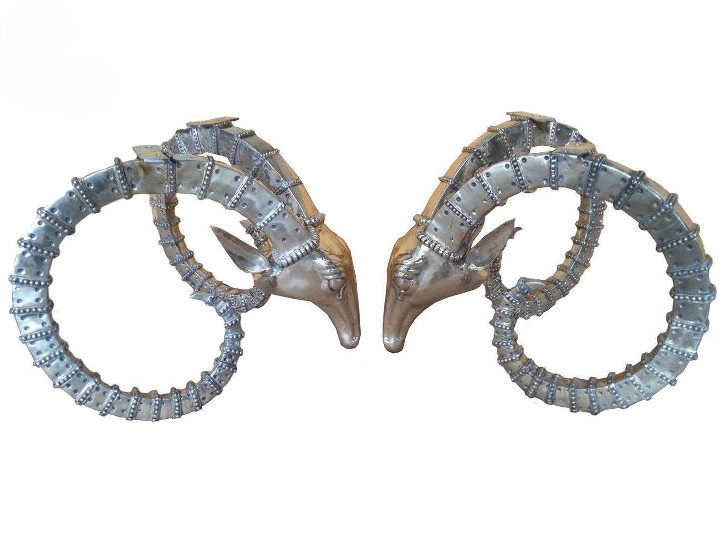 Pair of luxury handmade furniture table bases resembling deer heads with antlers, perfect for modern luxury decor, on a white background.