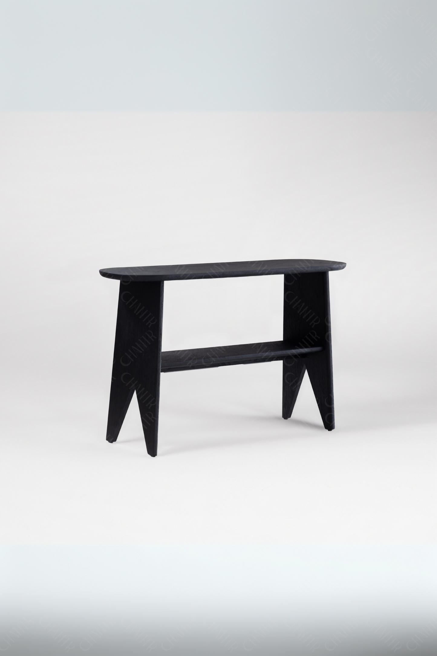 Black luxury handmade furniture console table made of acacia wood, ideal for modern luxury decor, on a white background.