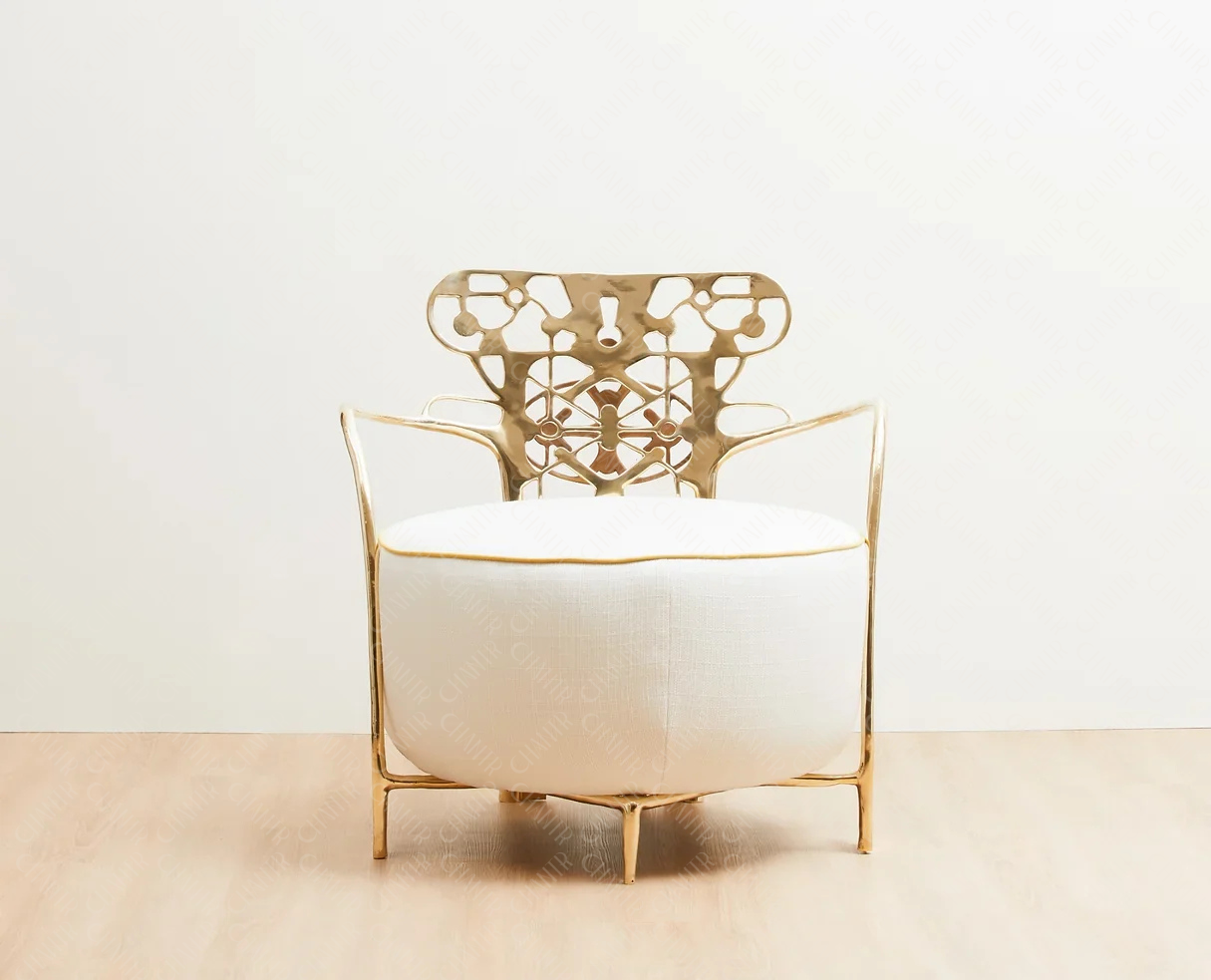 Decorative gold brass luxury handmade furniture chair with intricate metal frame, ideal for modern luxury decor, on a white background. - straight angle