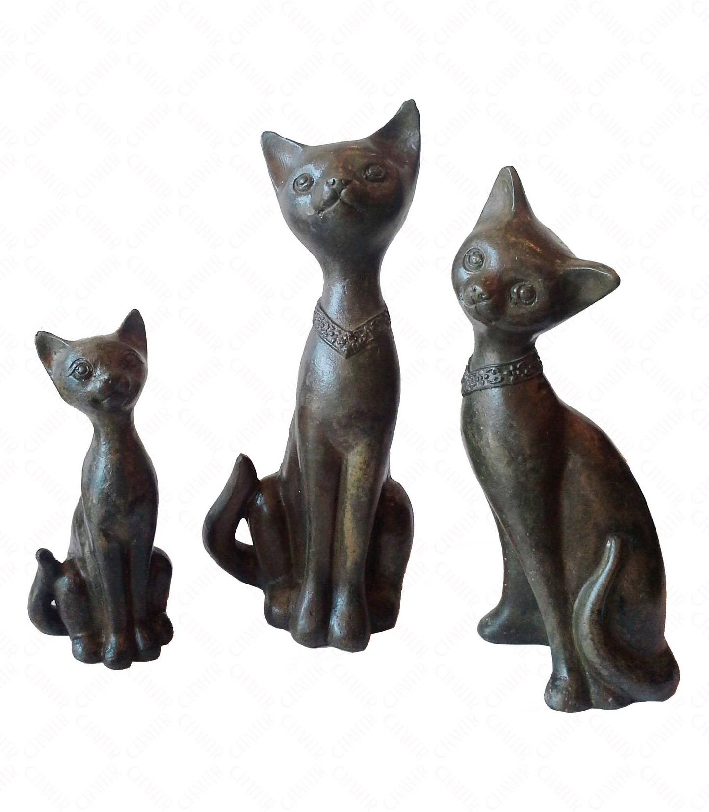 Three bronze luxury handmade furniture cat figurines in different sizes, ideal for modern luxury decor, on a white background.