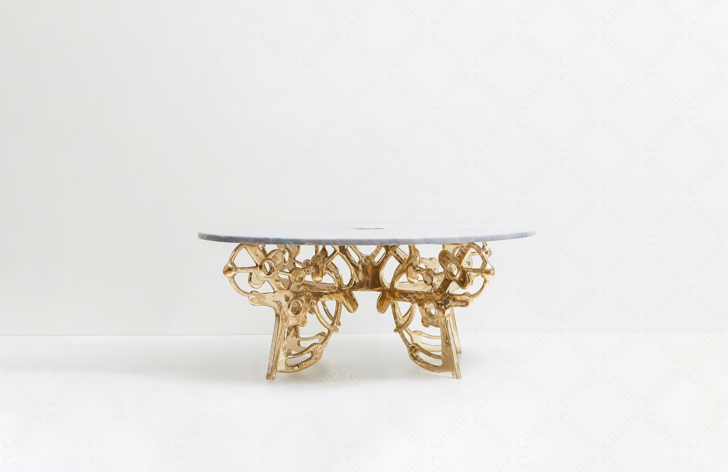 Gold brass luxury handmade furniture coffee table with decorative base, perfect for modern luxury decor, on a white background.