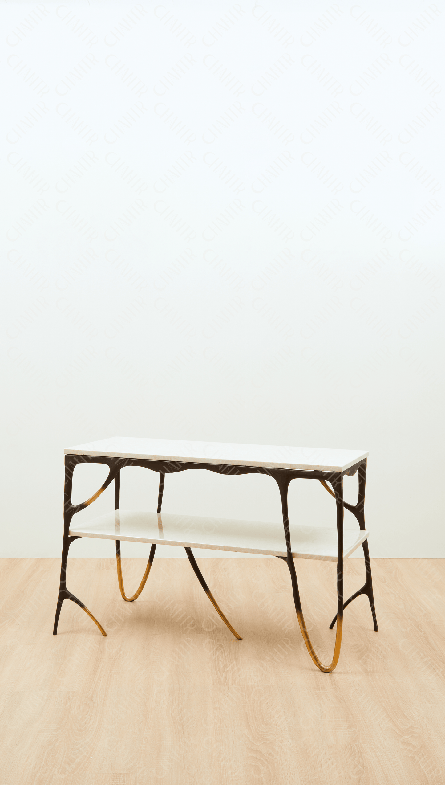 Modern black brass luxury handmade furniture console table with gold tips and two marble accents, perfect for modern luxury decor, on a plain background.