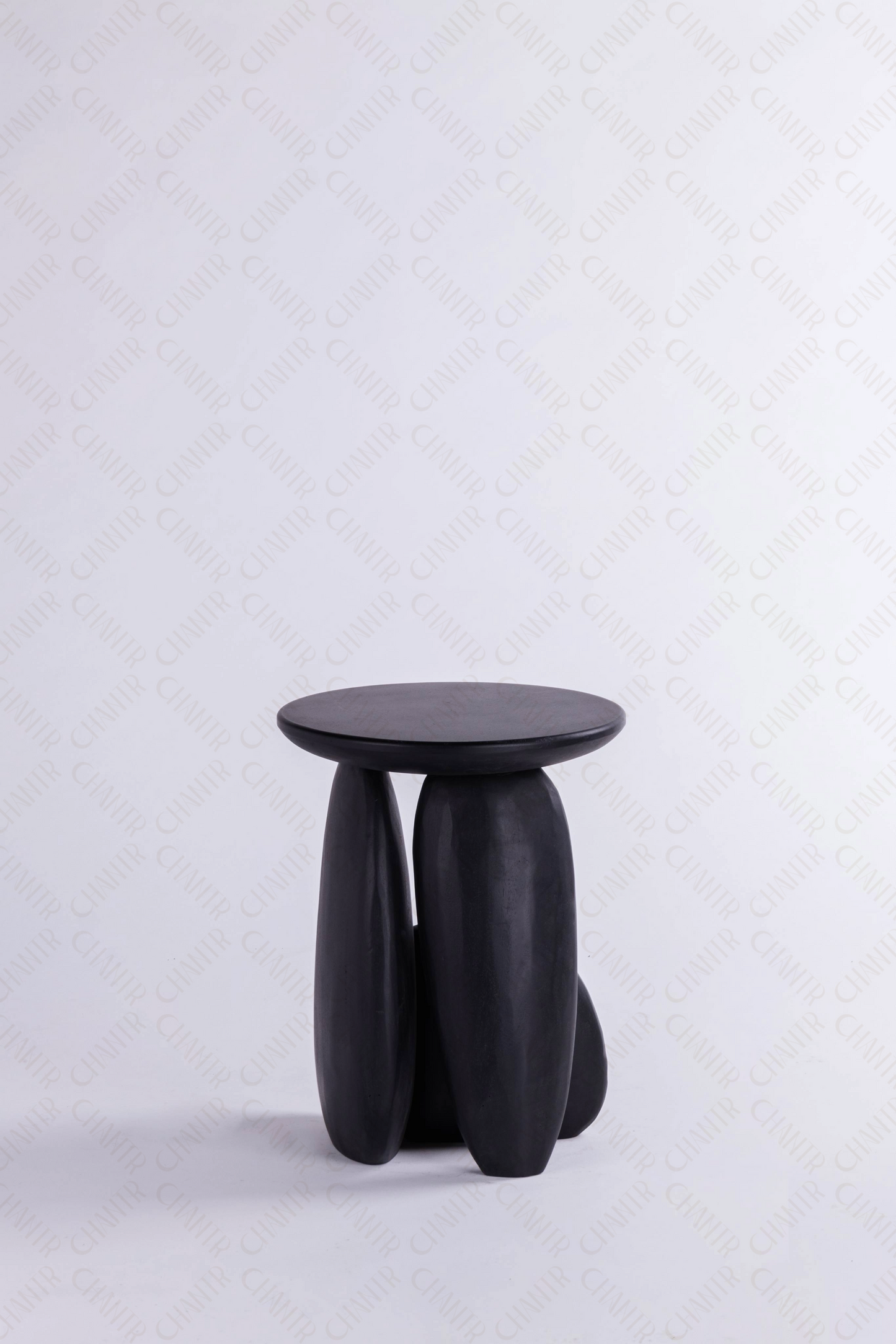 Black luxury handmade furniture side table, ideal for modern luxury decor, on a white background.