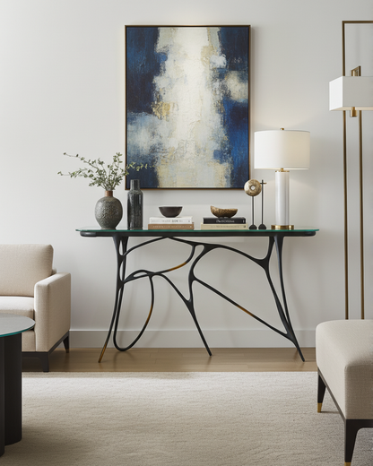 luxury handmade brass console table with glass top and decorative items in a living room setting