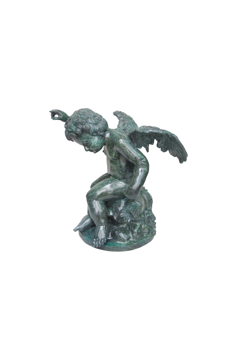 Bronze statue of an angel on a white background