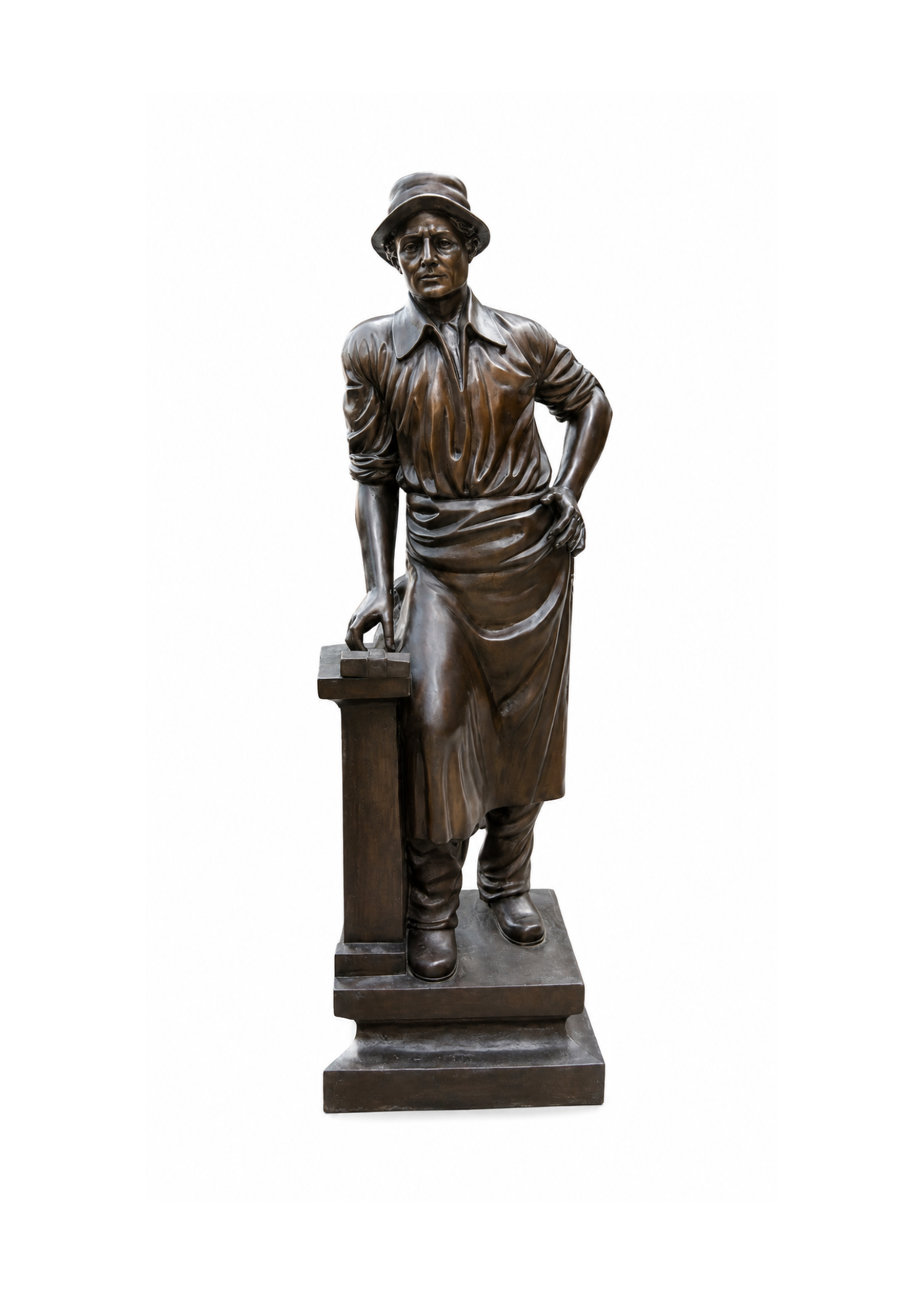 A dark bronze statue of a worker or carpenter leaning on a workbench, set against a solid white background.