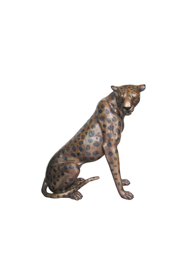 Bronze statue of a sitting leopard on a white background