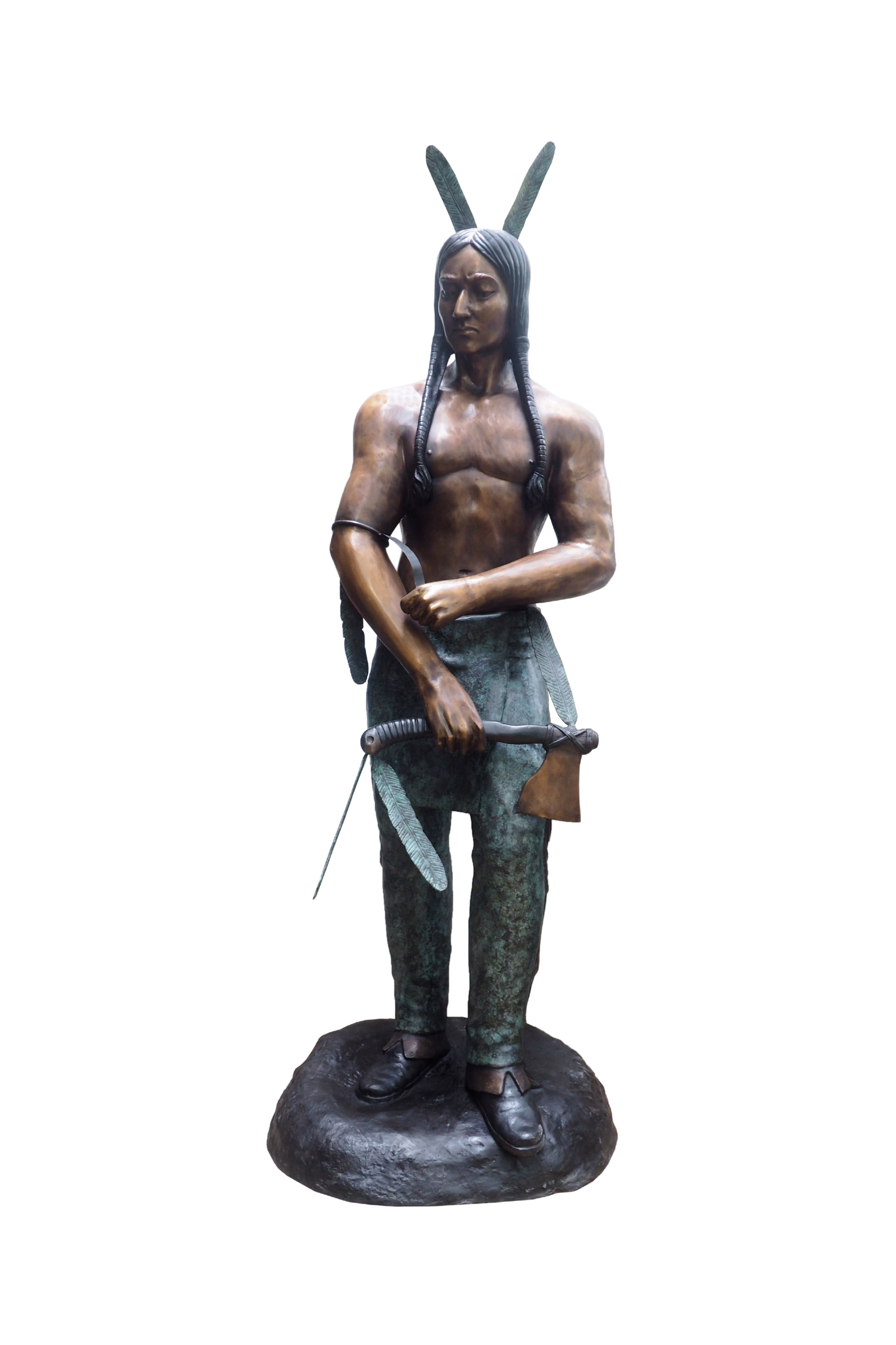 Bronze statue of a Native American figure with long hair and traditional attire on a white background