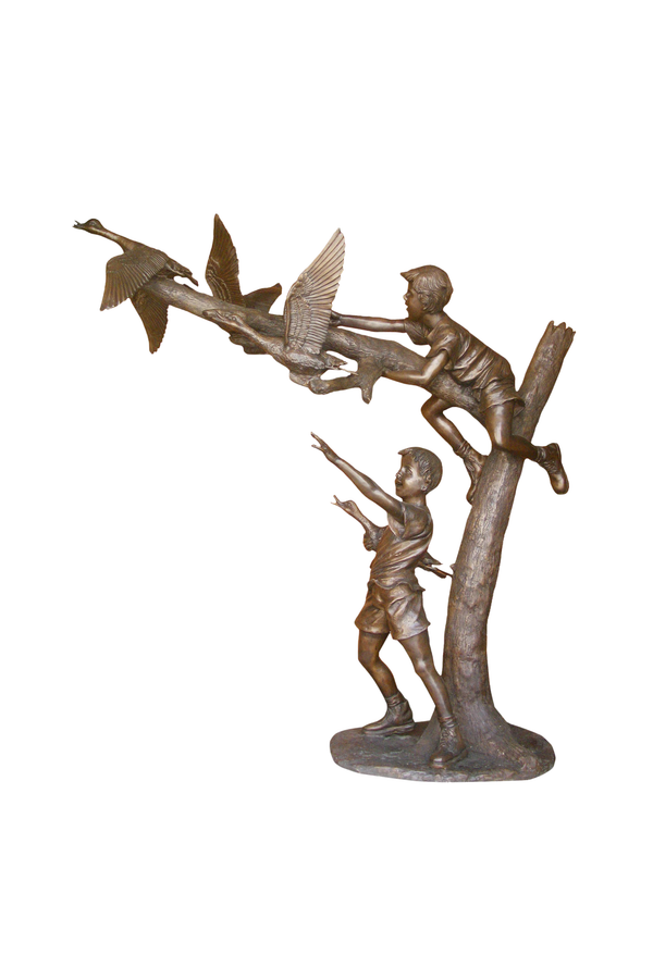 Bronze sculpture of two children playing with birds on a tree branch against a white background
