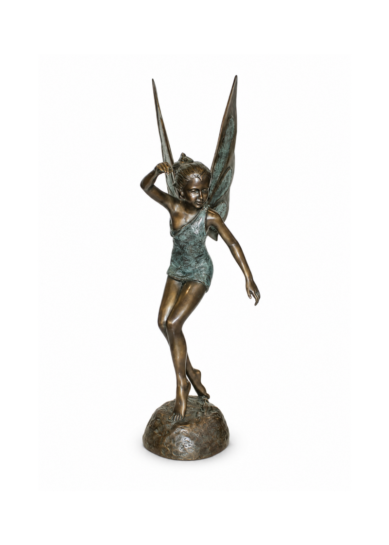 A bronze figurine of a winged fairy character standing on a rock base, holding a sword above her shoulder, photographed against a plain white background.