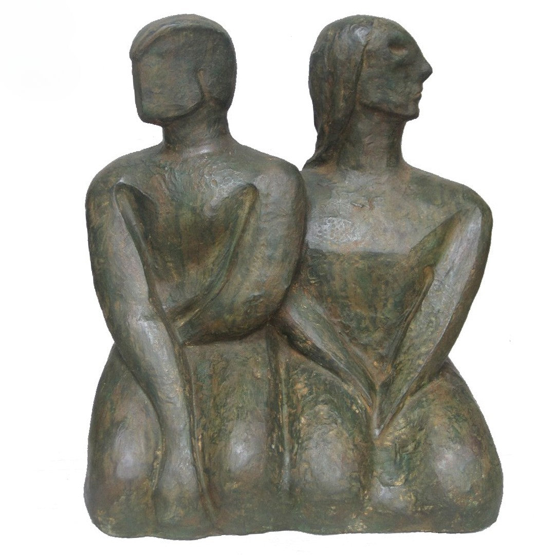 Bronze sculpture of two seated figures, male and female on a white background
