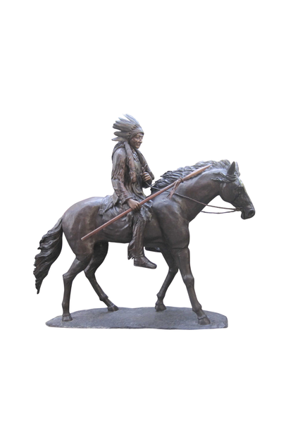 Bronze statue of a Native American on horseback with a headdress against a white background