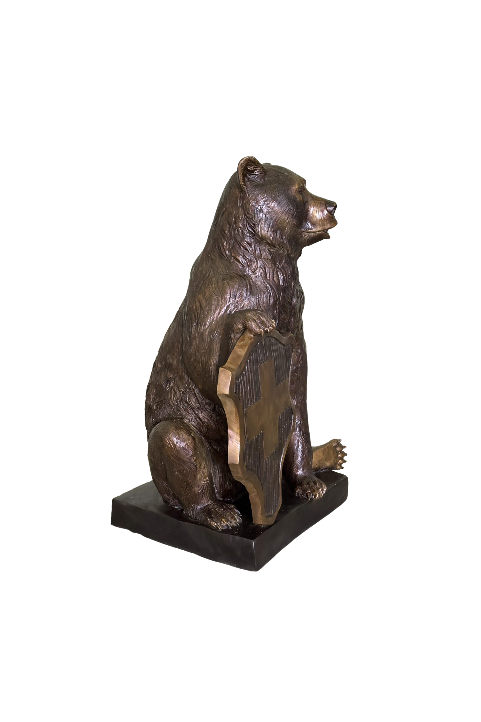 Bronze statue of a bear on a white background