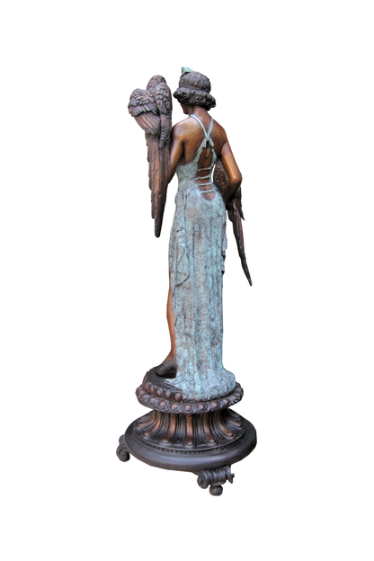 Bronze Statue of a woman holding two birds on a pedestal against a white background - back