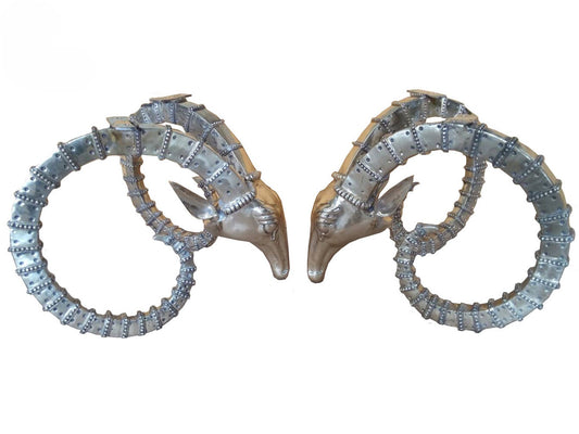 Pair of luxury handmade furniture table bases resembling deer heads with antlers, perfect for modern luxury decor, on a white background.