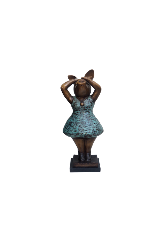 Statue of a piggy in a dress on a white background