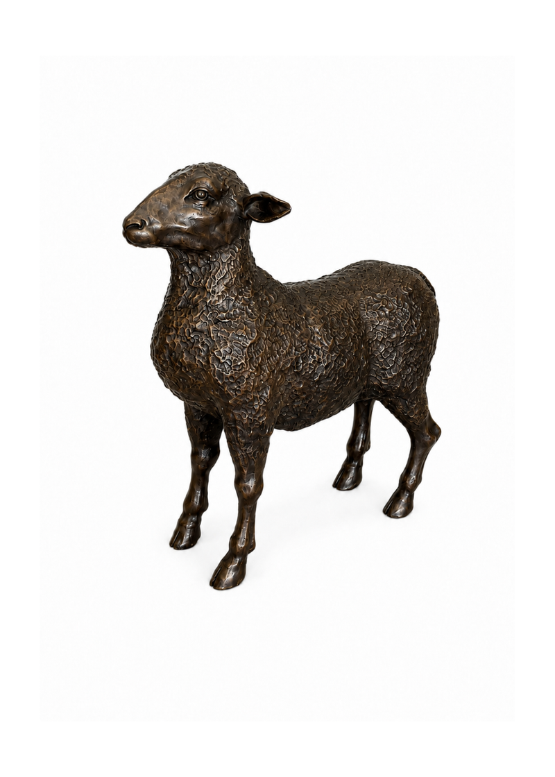 A small bronze sheep figurine with textured wool, standing on a plain white background.