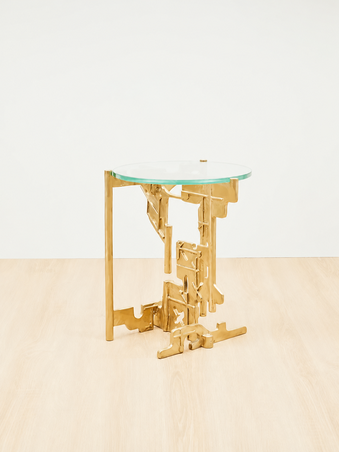 Relic side table with polished brass finish.