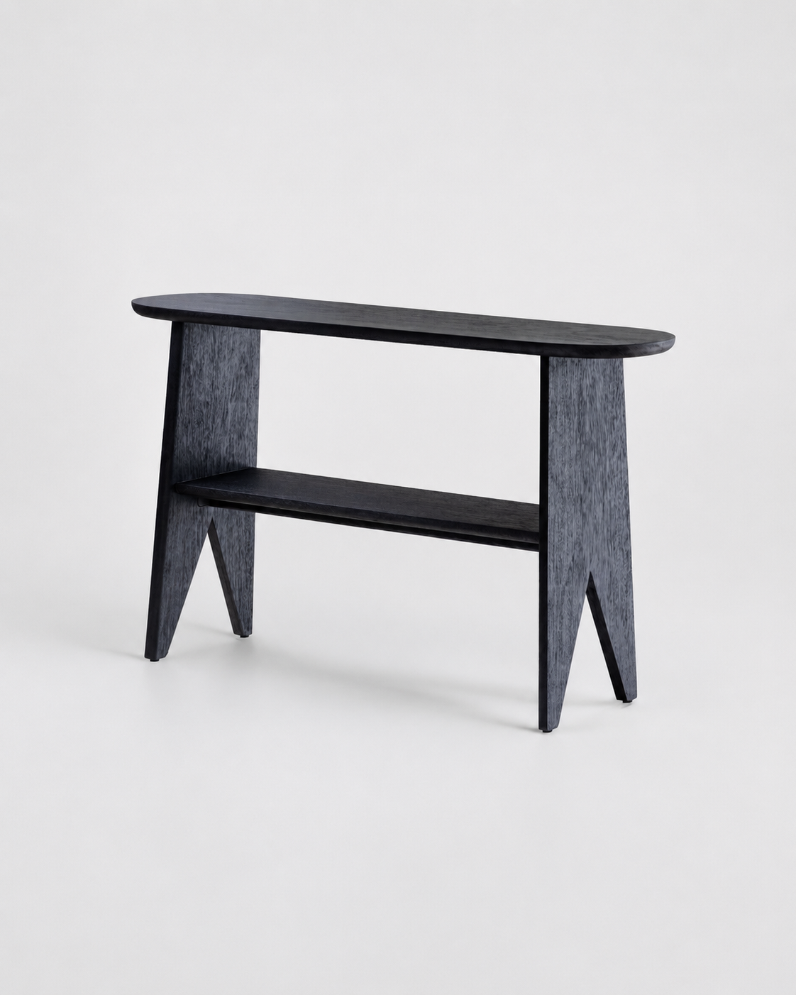 A modern black wooden console table with a rounded top, a lower shelf, and angled legs, shown on a light gray studio background.