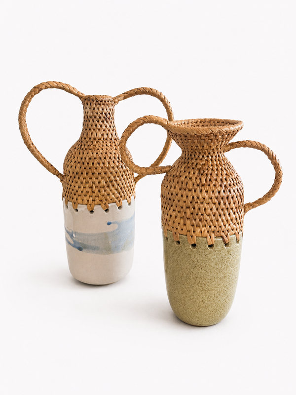 Two woven vases with natural and painted ceramic bottom finishes on a white background