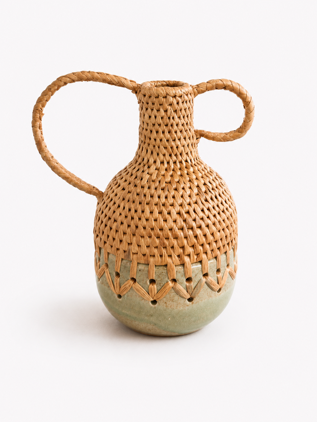 Pinched neck Woven vase with handles and green streaks ceramic bottom on a white background