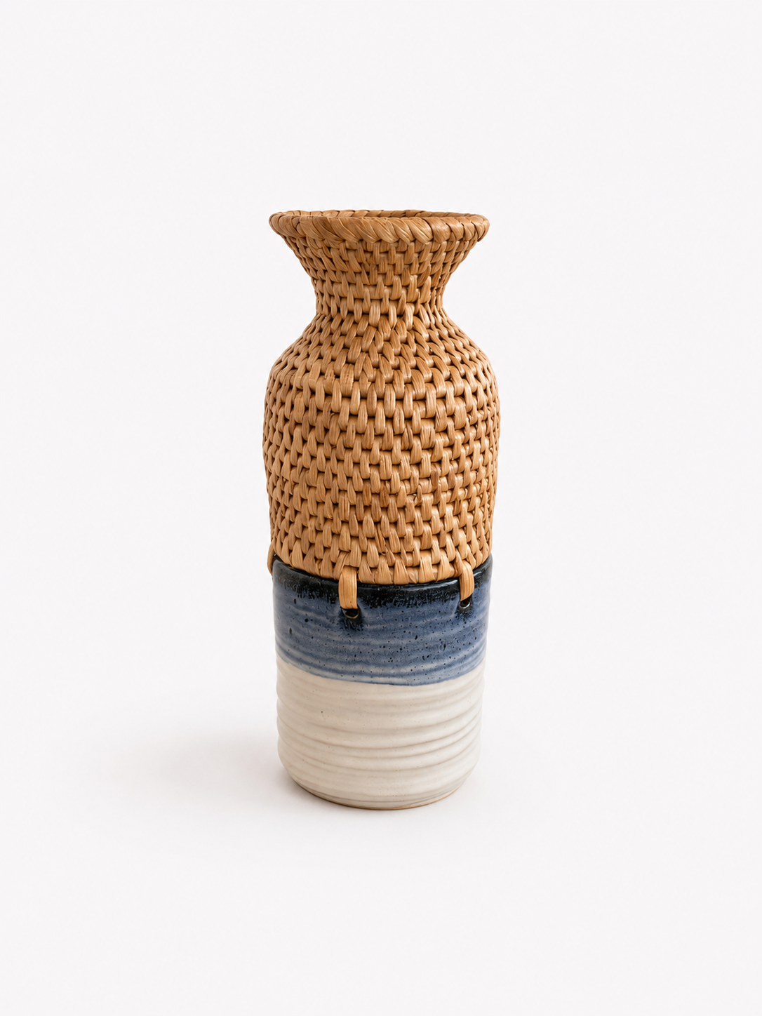 Two flared neck woven top with blue and white gradient ceramic bottom vase on a white background
