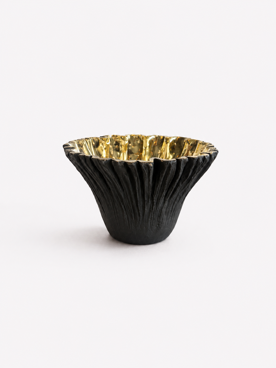 Black ruffled with gold interior brass bowl