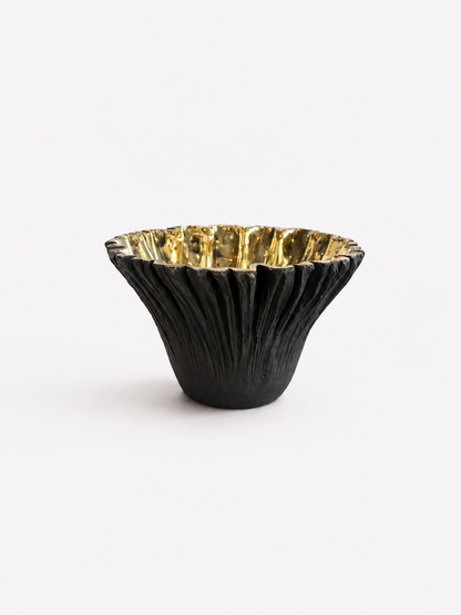 Black ruffled with gold interior brass bowl