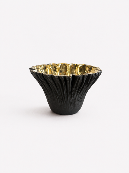 Black ruffled with gold interior brass bowl
