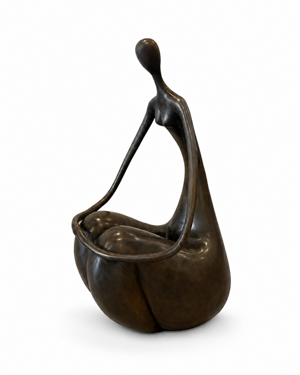 Bronze sculpture of a sitting and holding hands abstracted figure on a white background. Side view