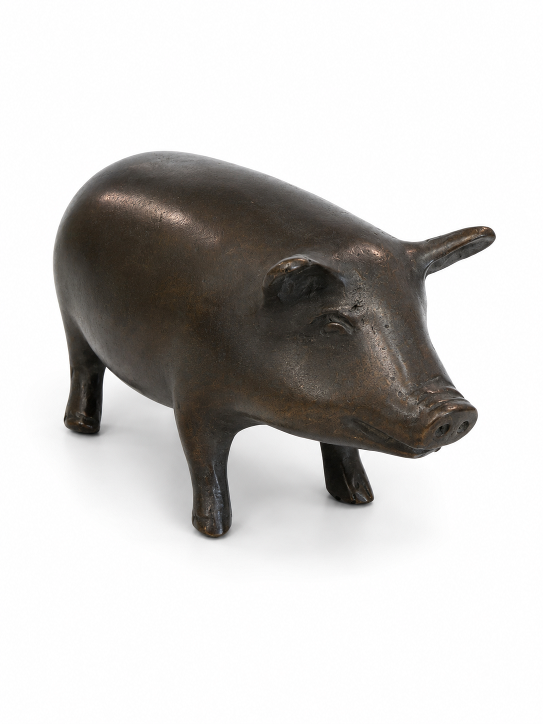 Bronze chubby pig figurine on a white background. Straight view
