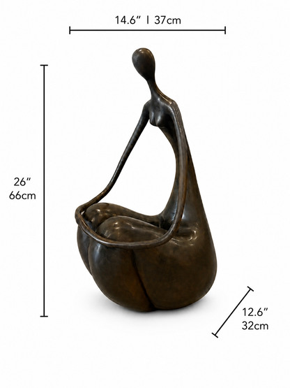 Bronze sculpture of a sitting and holding hands abstracted figure on a white background with measurements. Height 26 inches, width 12.6 inches and length 14.6 inches. 