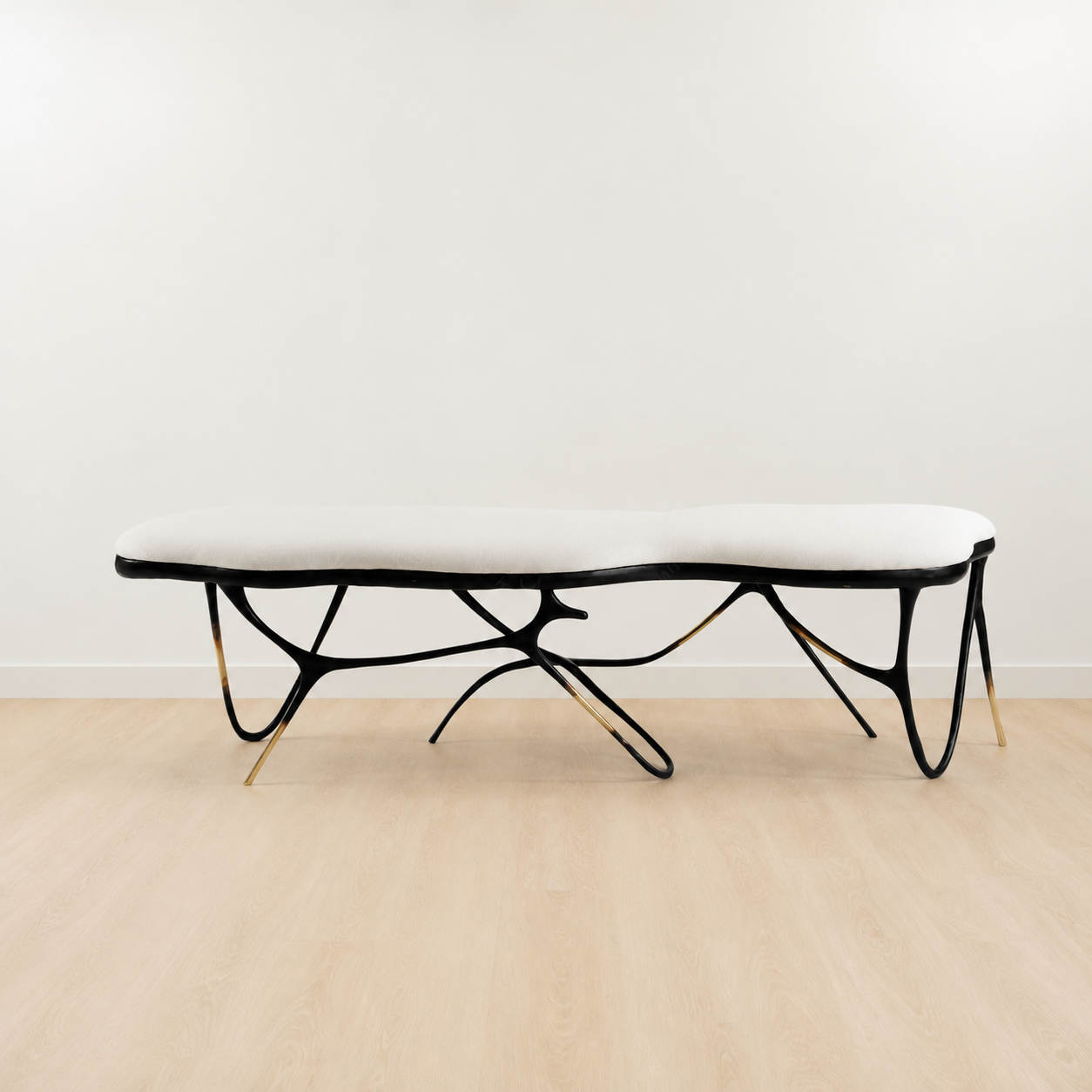 Black brass luxury handmade furniture bench with white cushion with modern design, ideal for modern luxury decor, on a white background.