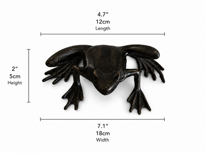 Bronze sculpture of frog about to jump with measurements on a white background. Height 2 inches or 5 cm. Width 7.1 inches and 18cm. Length 4.7 inches and 12cm. 