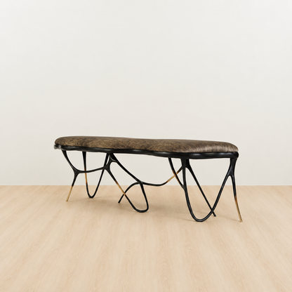 Black brass luxury handmade furniture bench with brown pattern cushion with modern design, ideal for modern luxury decor, on a white background. Side angle