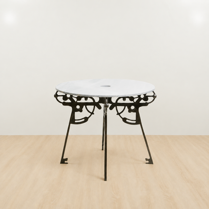 Small round table with white marble top and black brass base 