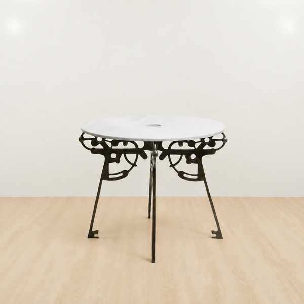 Small round table with white marble top and black brass base 