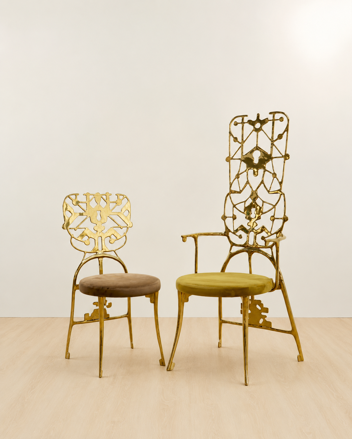 2 Gold chair with intricate design on a white background. Luxury handmade furniture. front angle
