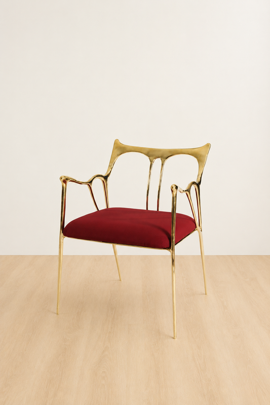 brass Chair with gold frame and red cushion on a white background