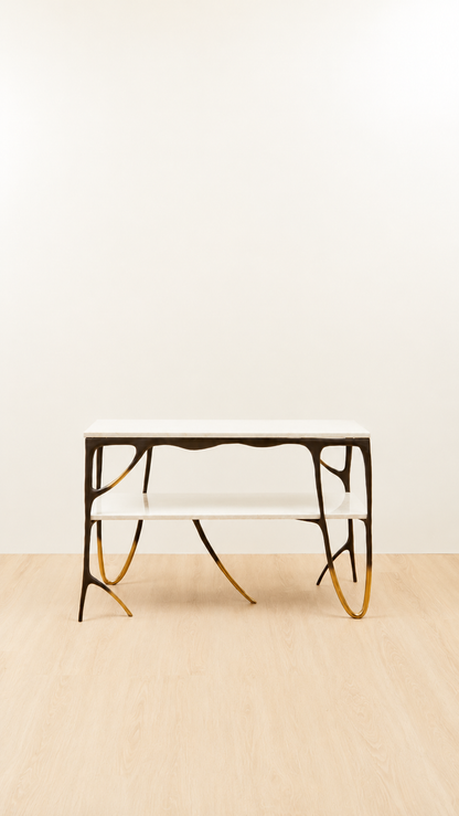 straight view of a two tiered console table with gold tips and two white marble tops