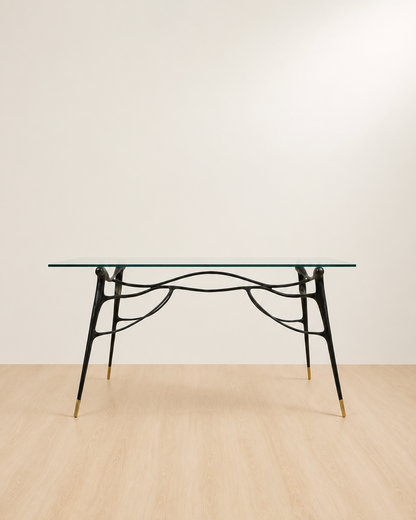 straight view of a Glass table top with black brass base