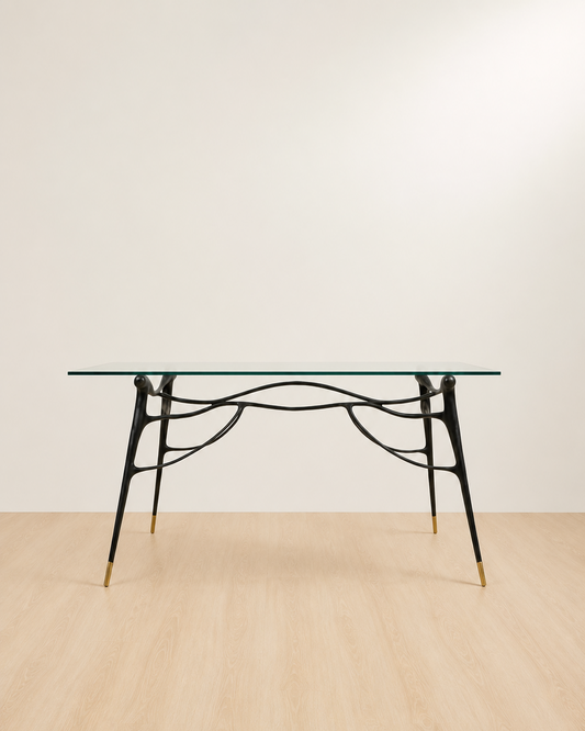 straight view of a Glass table top with black brass base
