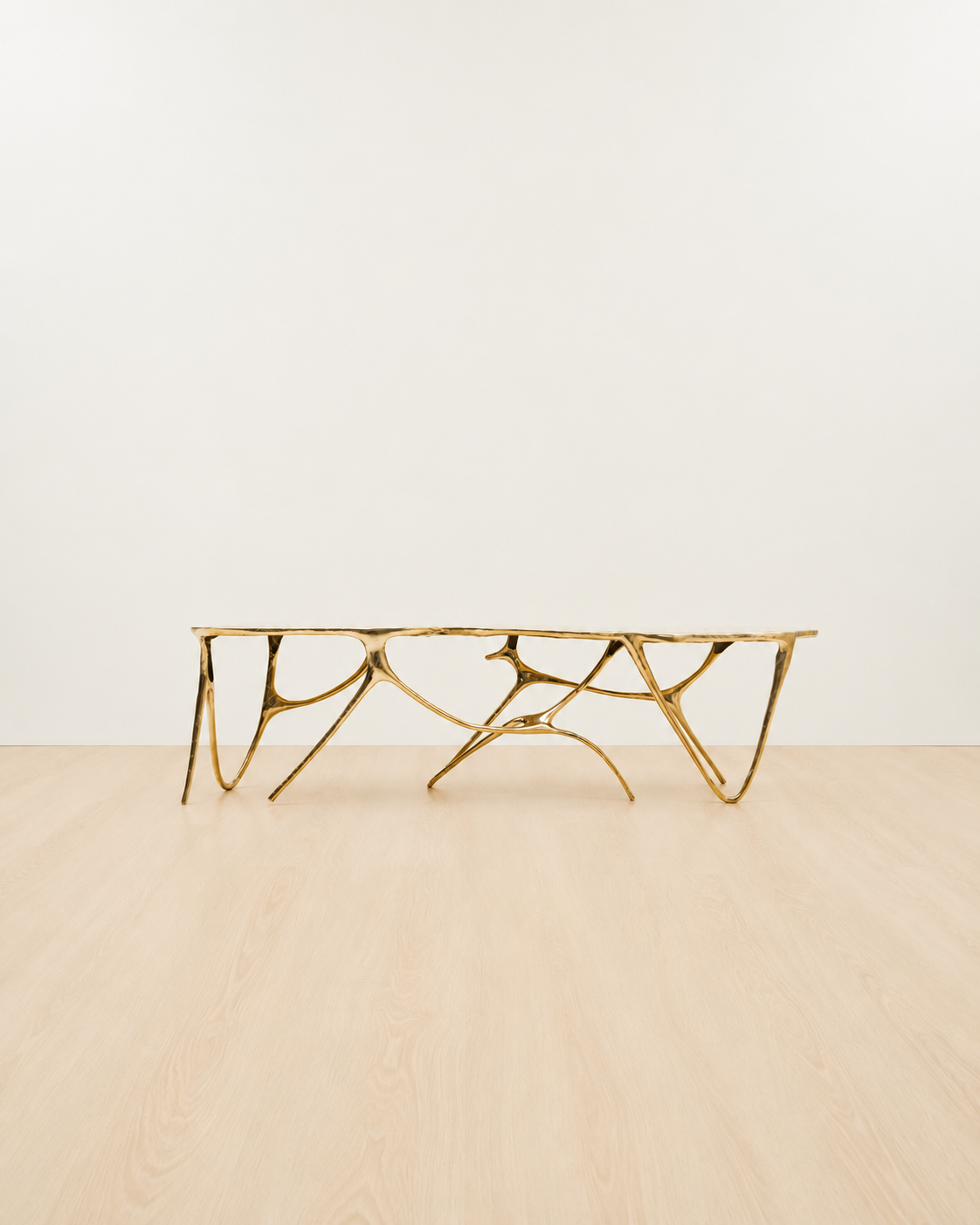 Gold brass luxury handmade furniture bench with modern design, ideal for modern luxury decor, on a white and beige background.