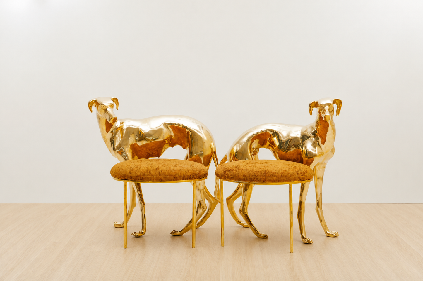 Two gold brass luxury handmade furniture dog-shaped chairs with neon yellow cushioned seats, ideal for modern luxury decor, on a orange background.