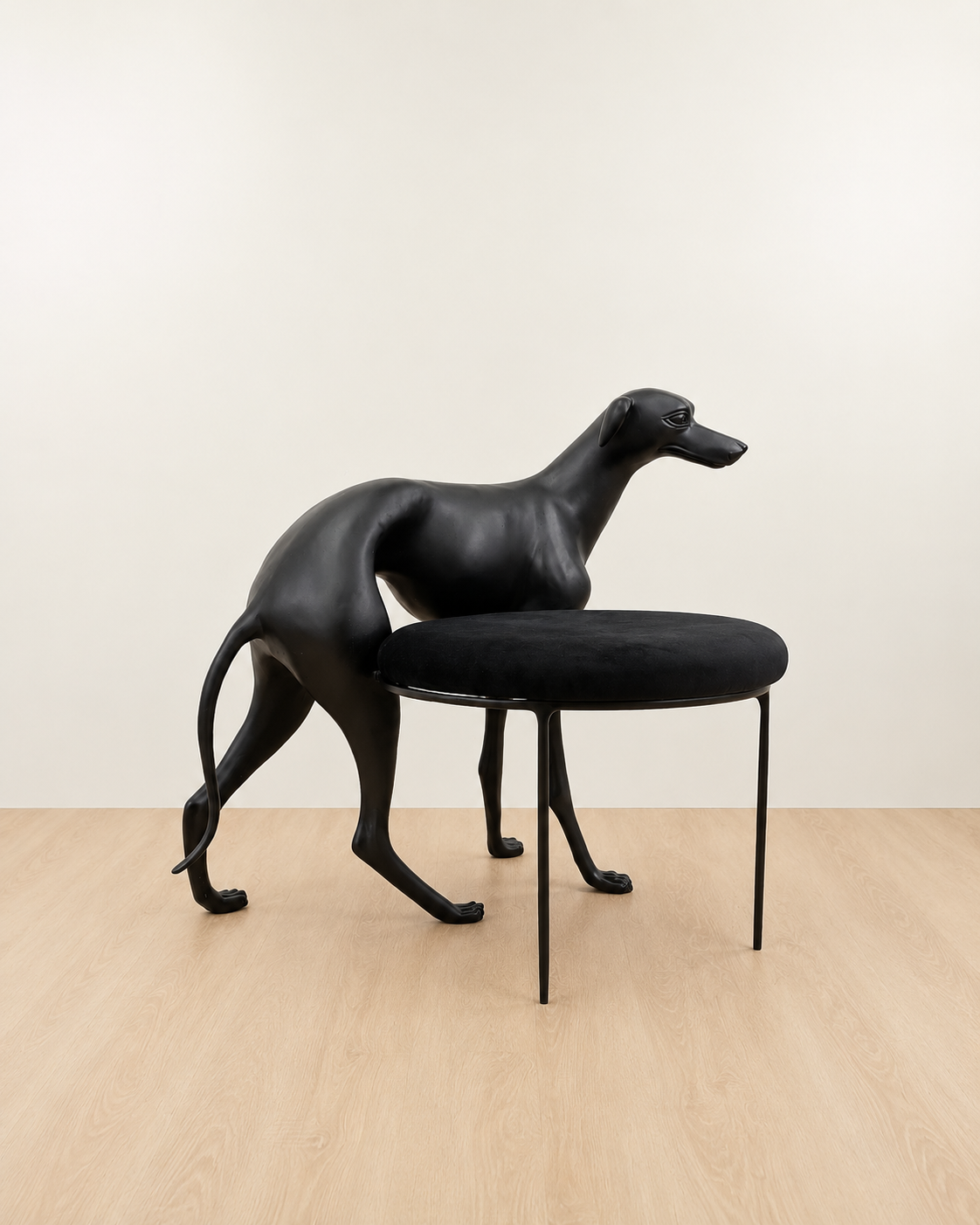 Black dog-shaped chair with a black cushion on a wooden floor. Luxury Modern Furniture