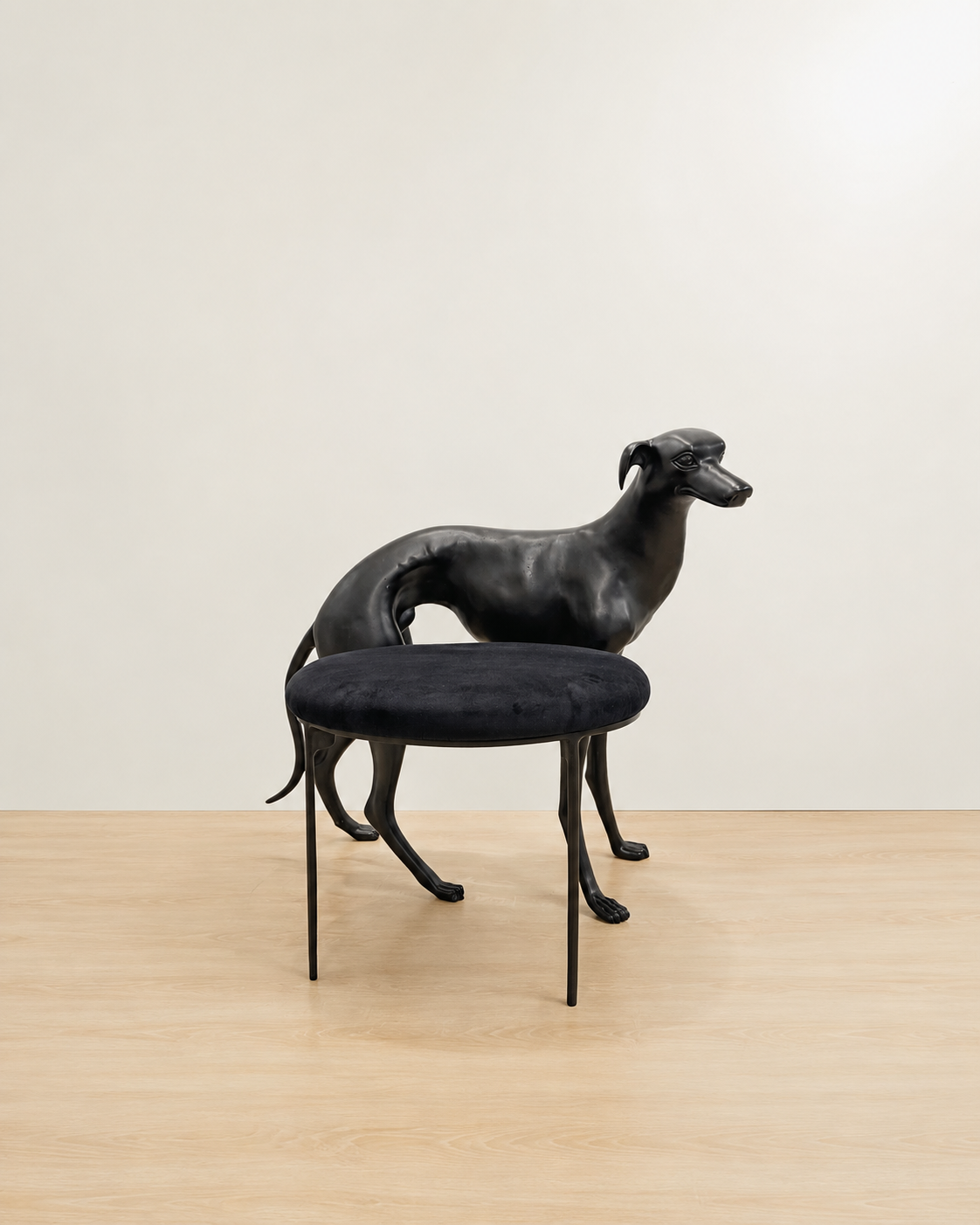 Black dog-shaped chair with a black cushion on a wooden floor. Luxury Modern Furniture