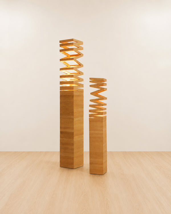 Teak Up floor lamps with zigzag design on a beige background.