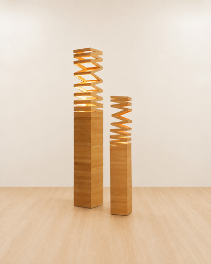 Two wooden floor lamps with zigzag design on a beige background