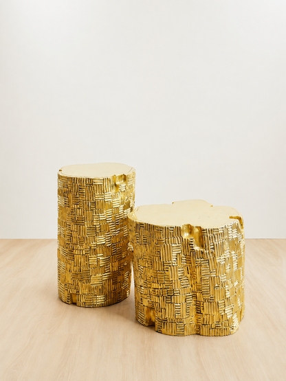 Gold brass side tables in different sizes with textured bases and organic shaped tops